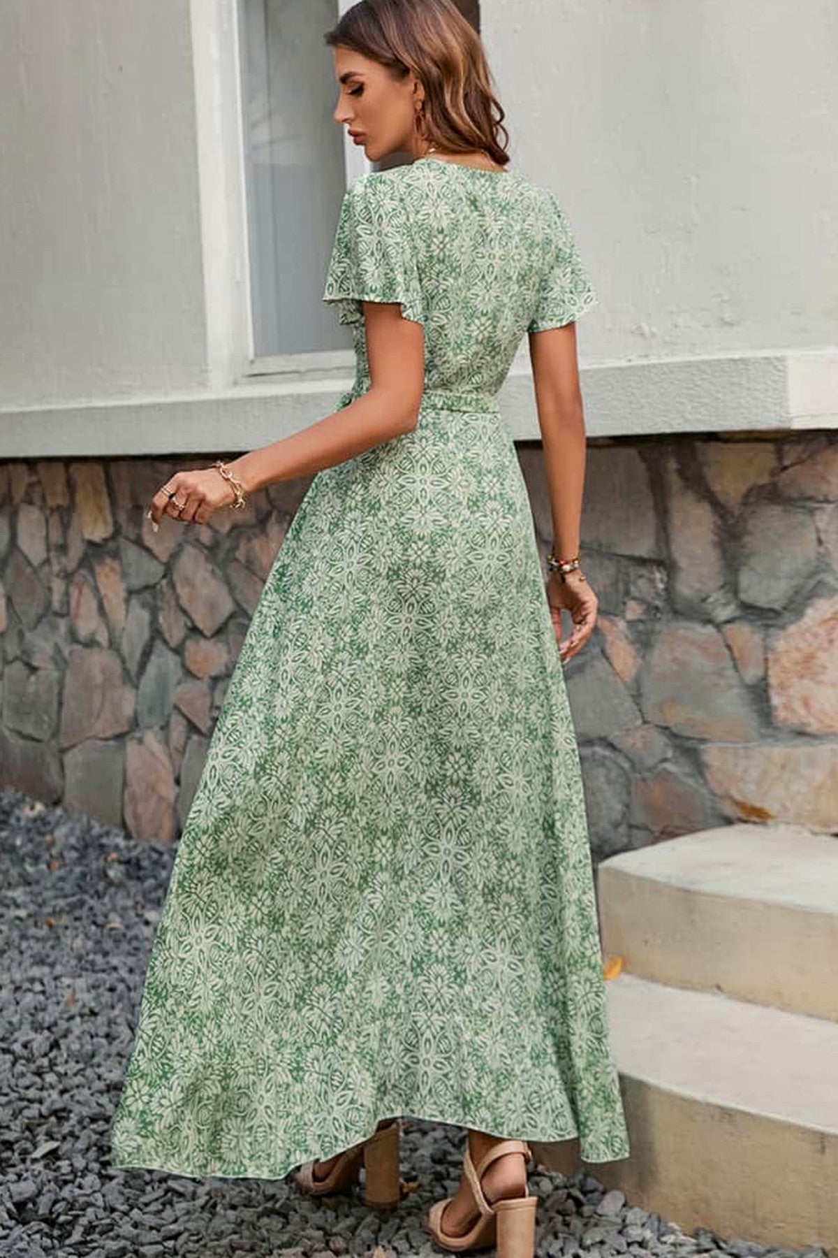 Abito lungo da cerimonia Paola, stampa floreale, scollo incrociato, verde e altri colori